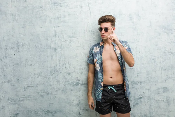 Young Caucasian Man Wearing Swimsuit Showing Number One Finger — Stock Photo, Image