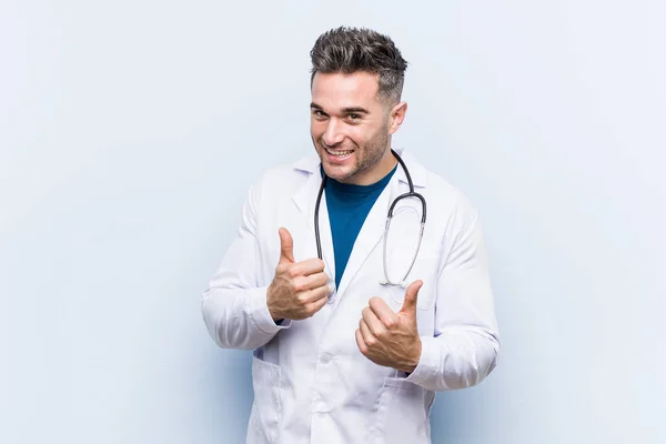 Young Handsome Doctor Man Raising Both Thumbs Smiling Confident — Stock Photo, Image