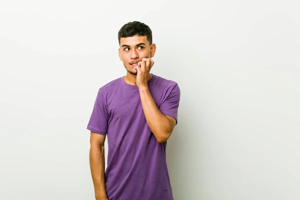 Young Hispanic Man Biting Fingernails Nervous Very Anxious — Stock Photo, Image