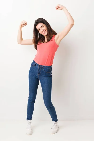 Full Body Young Woman White Background Showing Strength Gesture Arms — Stock Fotó