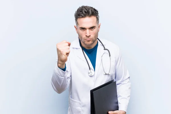 Caucasian Doctor Man Holding Folder Showing Fist Camera Aggressive Facial — Stock Photo, Image