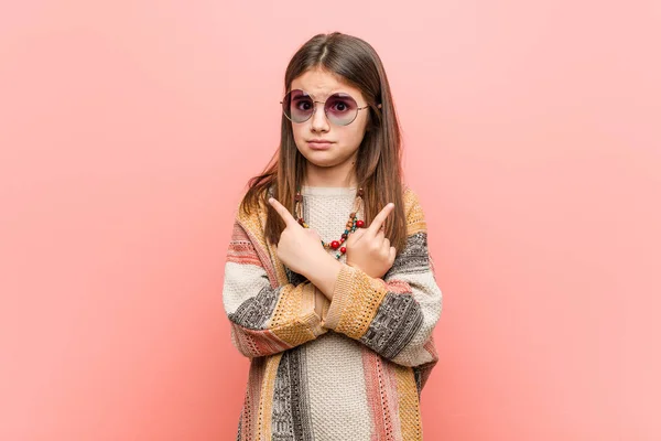 Little Hippie Girl Points Sideways Trying Choose Two Options — Stock Photo, Image