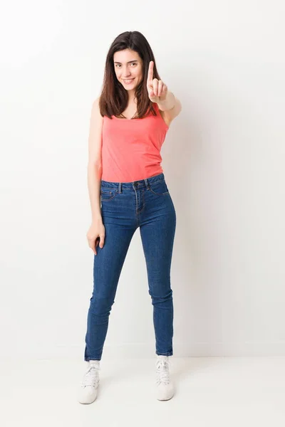 Full Body Young Woman White Background Showing Number One Finger — Stock Photo, Image