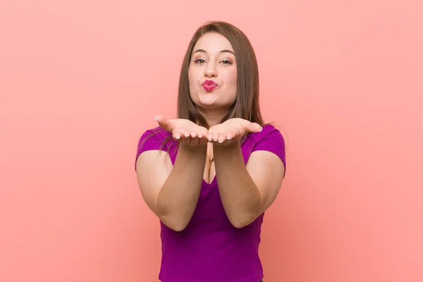 Young Hispanic Woman Pink Wall Folding Lips Holding Palms Send — Stock Photo, Image