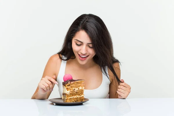 Young Hispanic Woman Eating Carrot Cake — Stock Photo, Image