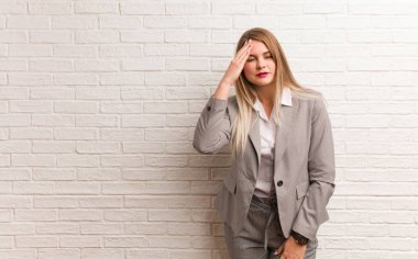 Young russian business woman try to listening a gossip