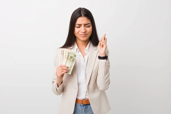 Young Arab Business Woman Holding Dollars Crossing Fingers Having Luck — Stock Photo, Image