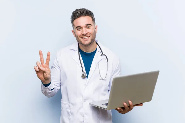 Caucasian Doctor Man Holding Laptop Showing Number Two Fingers — Stock Photo, Image