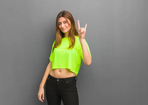 Young Cool Russian Girl Doing Rock Gesture — Stock Photo, Image