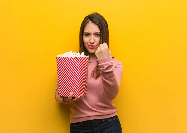 Young Cute Woman Holding Popcorn Bucket Showing Fist Front Angry — Stock Photo, Image