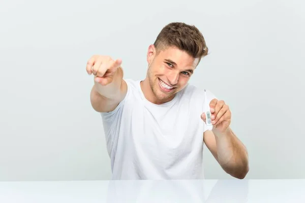 Young Handsome Man Holding Thermometer Cheerful Smiles Pointing Front — Stock Photo, Image