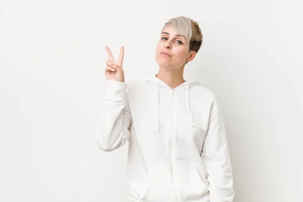 Young Curvy Woman Wearing White Hoodie Showing Number Two Fingers — Stok fotoğraf