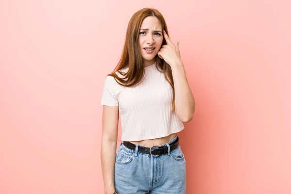 Young Redhead Ginger Woman Pink Wall Showing Disappointment Gesture Forefinger — Stock Photo, Image