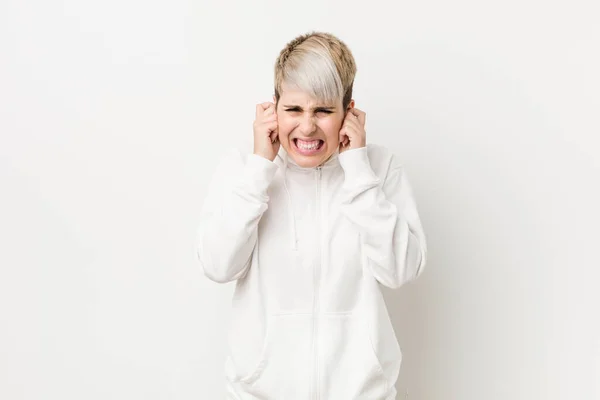 Young Curvy Woman Wearing White Hoodie Covering Ears Hands — Stockfoto