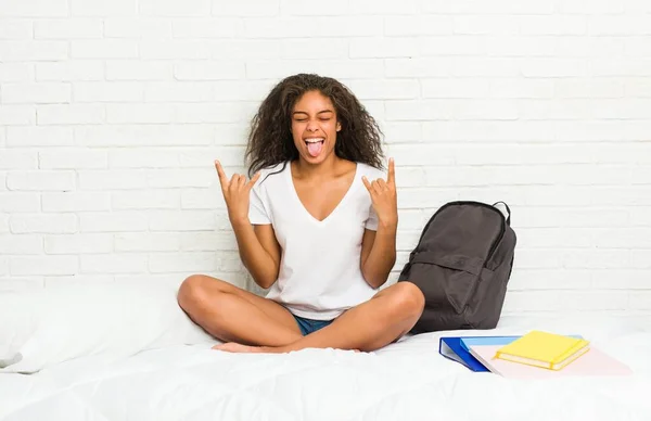 Young African American Student Woman Bed Showing Rock Gesture Fingers — Stock Photo, Image