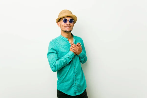 Young Hispanic Man Wearing Summer Clothes Has Friendly Expression Pressing — Stock Photo, Image