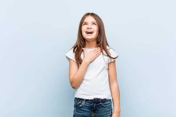 Cute Girl Laughs Out Loudly Keeping Hand Chest — Stock Photo, Image