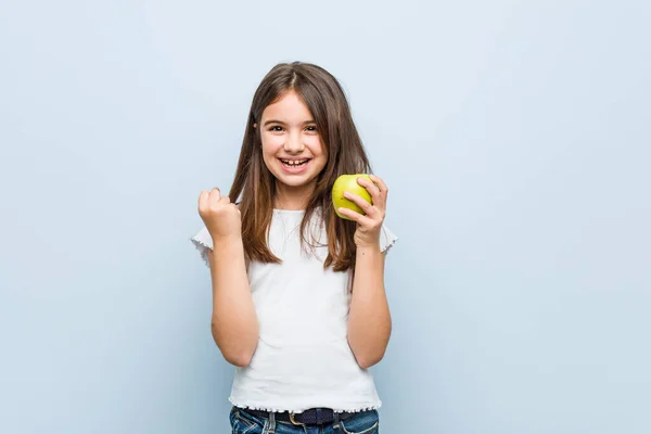 Little Caucasian Girl Holding Green Apple Cheering Carefree Excited Victory — Stock Photo, Image