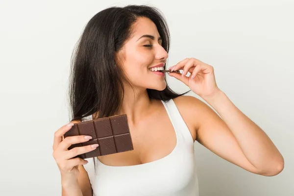 Young Hispanic Woman Holding Chocolate Tablet — Stock Photo, Image