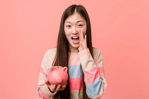 Young Asian Woman Holding Piggy Bank Shouting Excited Front — Stock Photo, Image