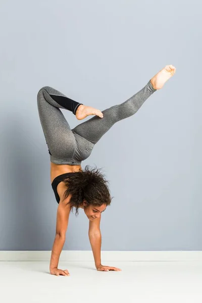 Young African American Sporty Woman Doing Rhythmic Gymnastics Poses — Stock Photo, Image