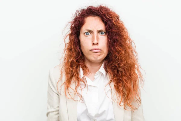 Young Natural Redhead Business Woman Isolated White Background Shrugs Shoulders — Stock Photo, Image