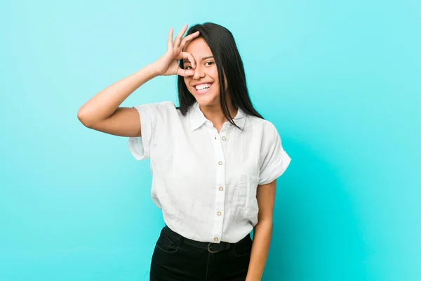 Young Hispanic Cool Woman Blue Wall Excited Keeping Gesture Eye — Stock Photo, Image