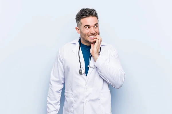 Young Handsome Doctor Man Biting Fingernails Nervous Very Anxious — Stock Photo, Image