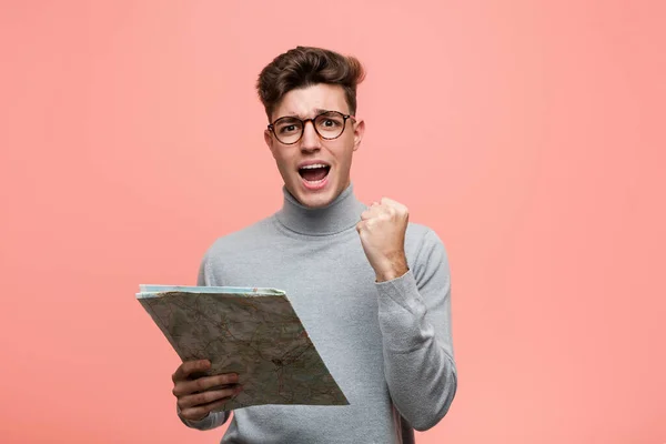 Young Cool Man Holding Map Celebrating Victory Success — Stock Photo, Image