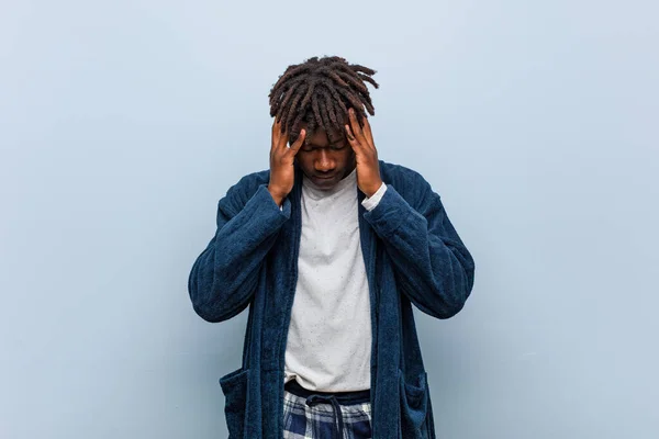 Young African Black Man Wearing Pajama Touching Temples Having Headache — Stockfoto