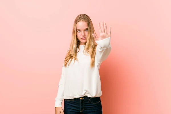 Young Blonde Teenager Woman Standing Outstretched Hand Showing Stop Sign — Stock Photo, Image