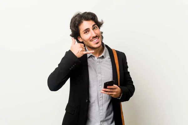 Elinde Telefon Tutan Genç Bir Adamı Parmaklarıyla Bir Cep Telefonu — Stok fotoğraf