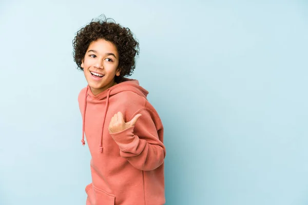 African American Little Boy Isolated Points Thumb Finger Away Laughing — Stock Photo, Image