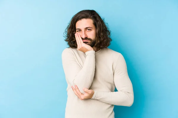 Young Long Hair Man Isolated Blue Background Who Bored Fatigued — Stock Photo, Image