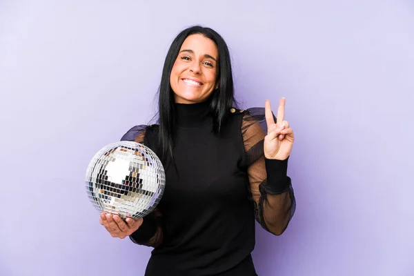 Woman Holding Ball Party Isolated Purple Background Showing Number Two — Stock Photo, Image