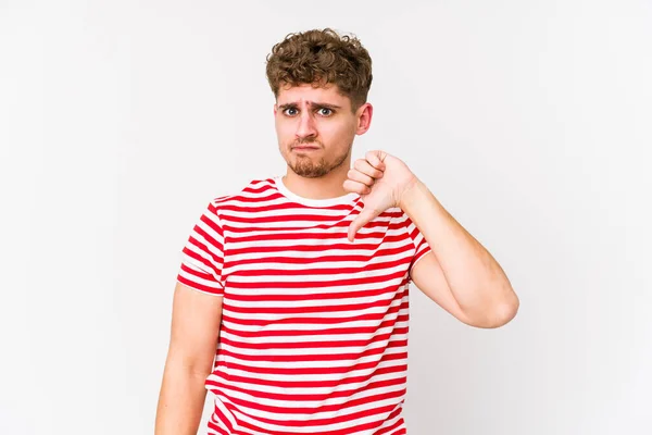 Young Blond Curly Hair Caucasian Man Isolated Showing Thumb Disappointment — Stock Photo, Image
