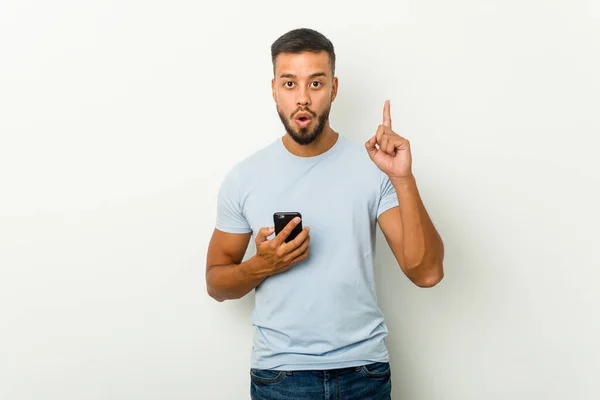 Joven Mixta Raza Asiático Hombre Sosteniendo Teléfono Teniendo Algunos Grande —  Fotos de Stock