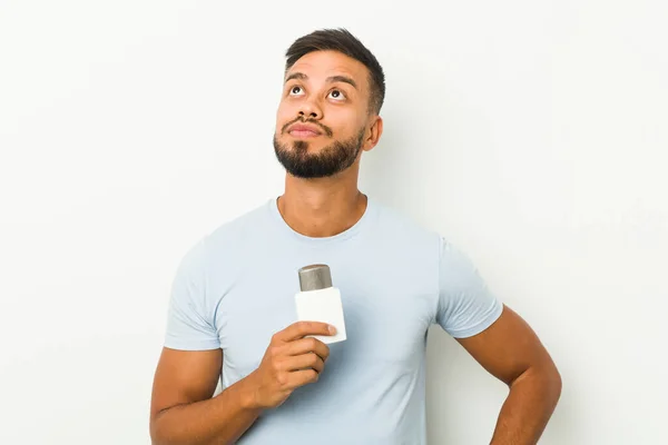 Young South Asian Man Holding Shave Cream Dreaming Achieving Goals — Stock Photo, Image