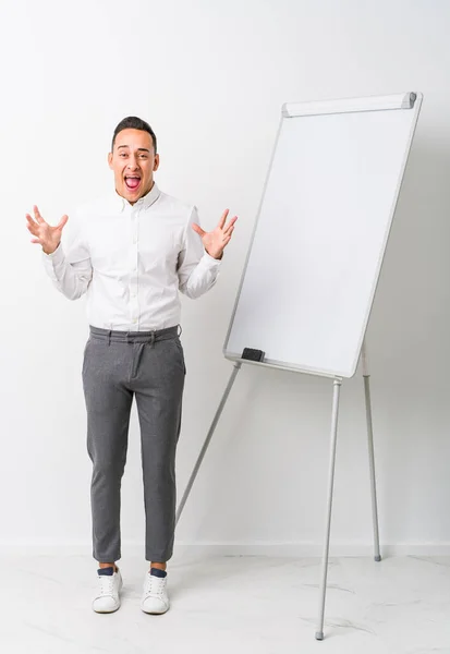 Young Latin Coaching Man Whiteboard Isolated Celebrating Victory Success Surprised — Stock Photo, Image