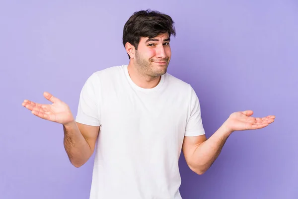 Young Man Isolated Purple Background Doubting Shrugging Shoulders Questioning Gesture — Stock Photo, Image