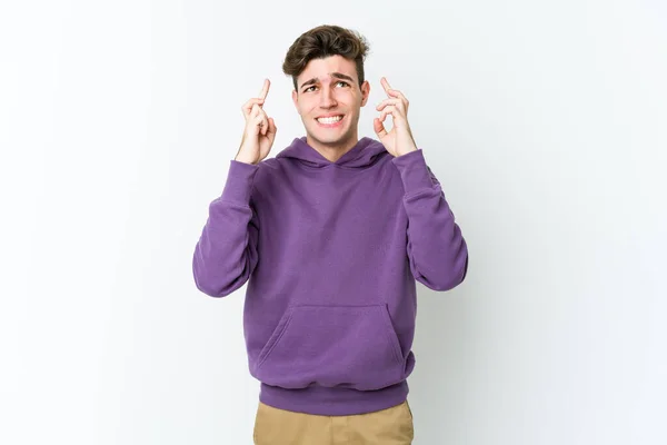 Young Caucasian Man Isolated White Background Crossing Fingers Having Luck — Stock Photo, Image