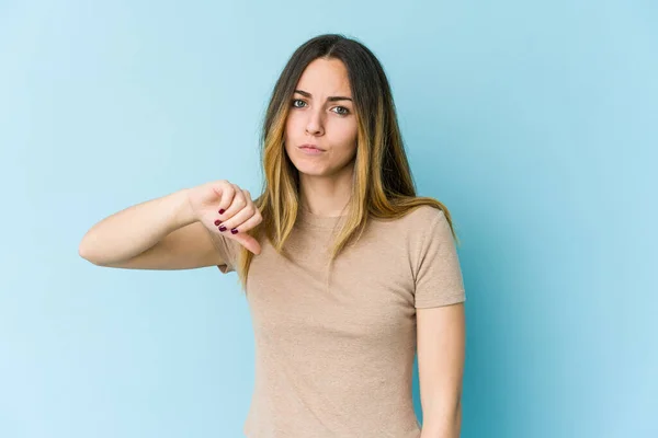 Young Caucasian Woman Isolated Blue Background Showing Dislike Gesture Thumbs — Stock Photo, Image