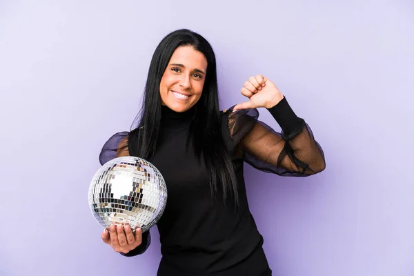Woman Holding Ball Party Isolated Purple Background Feels Proud Self — Stock Photo, Image