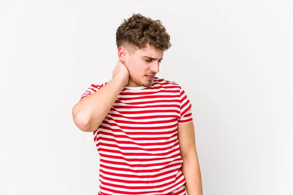 Young Blond Curly Hair Caucasian Man Isolated Having Neck Pain — Stock Photo, Image