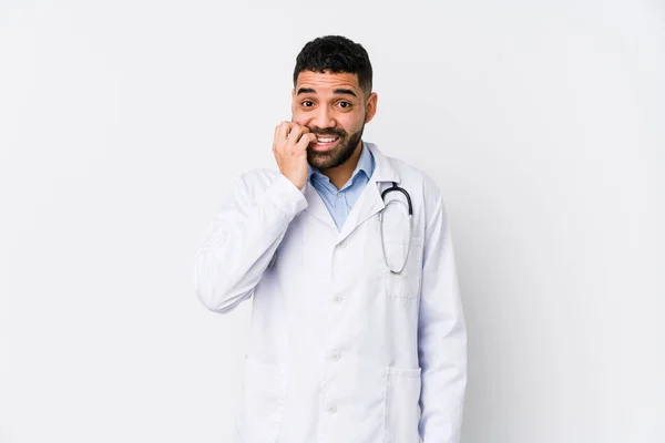 Young Arabian Doctor Man Isolated Biting Fingernails Nervous Very Anxious — Stock Photo, Image