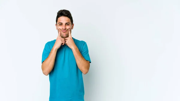 Jovem Caucasiano Isolado Fundo Branco Duvidando Entre Duas Opções — Fotografia de Stock