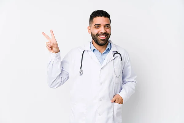 Young Arabian Doctor Man Isolated Joyful Carefree Showing Peace Symbol — Stock Photo, Image