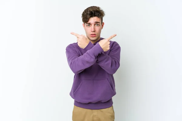 Young Caucasian Man Isolated White Background Points Sideways Trying Choose — Stock Photo, Image