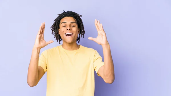 Young African American Rasta Man Laughs Out Loudly Keeping Hand — Stock Photo, Image