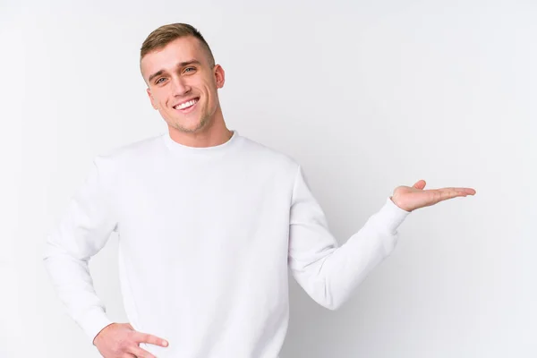 Young Caucasian Man White Background Showing Copy Space Palm Holding — Stock Photo, Image